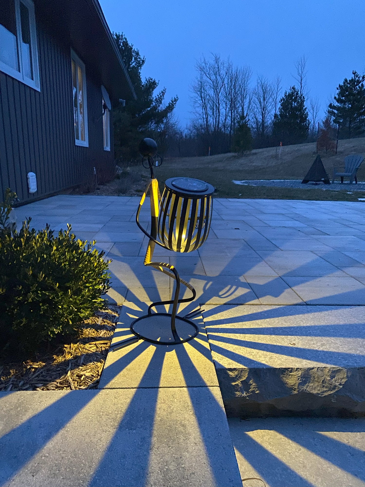 Abstract Tribal Lady Figurine Sculpture Lunging with Solar Light - Image 3