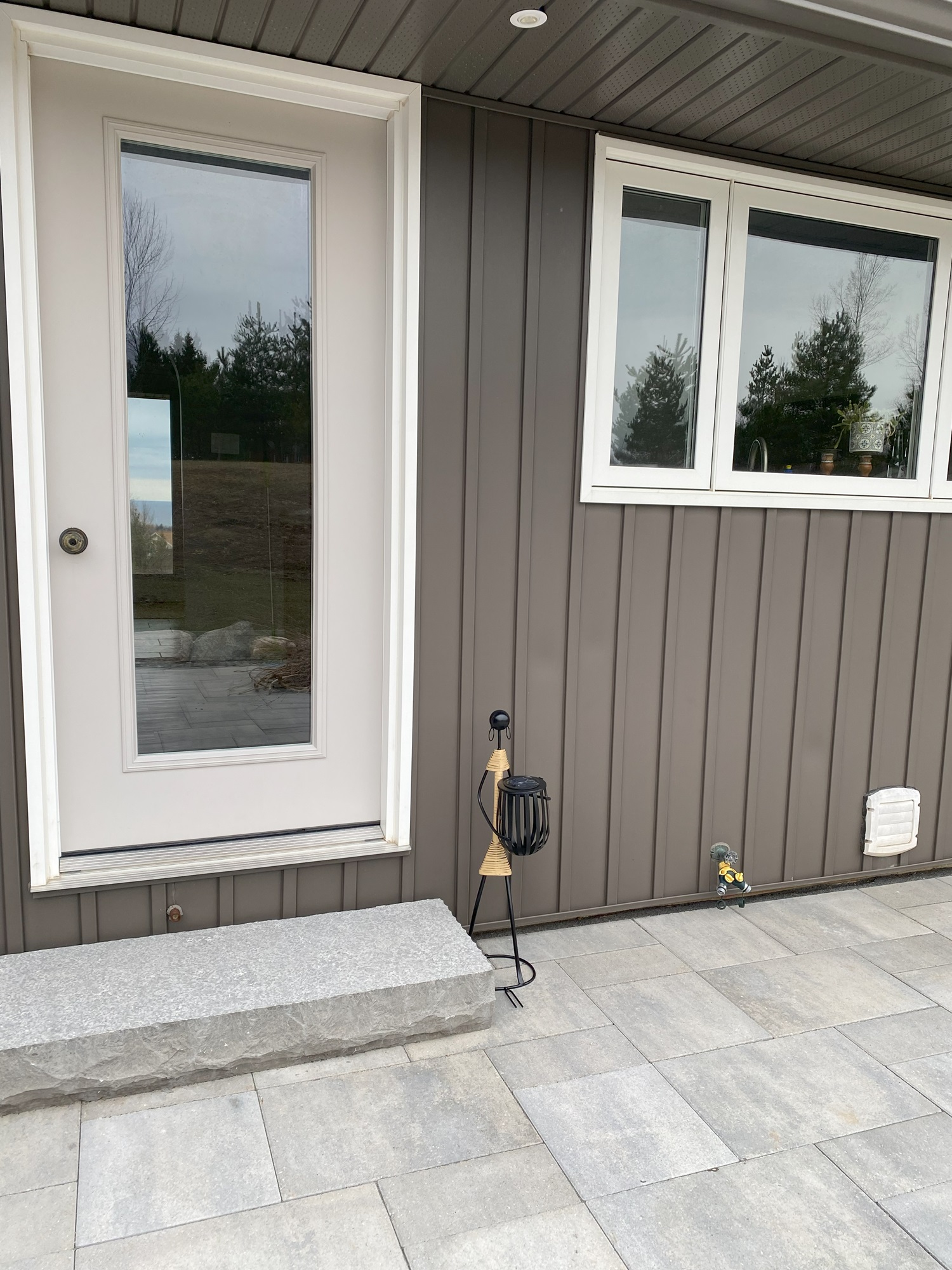 Artisanal Tribal-Inspired Solar LED Sentinel Abstract Tribal Lady Figurine Metal Sculpture holding with Solar light - Image 2